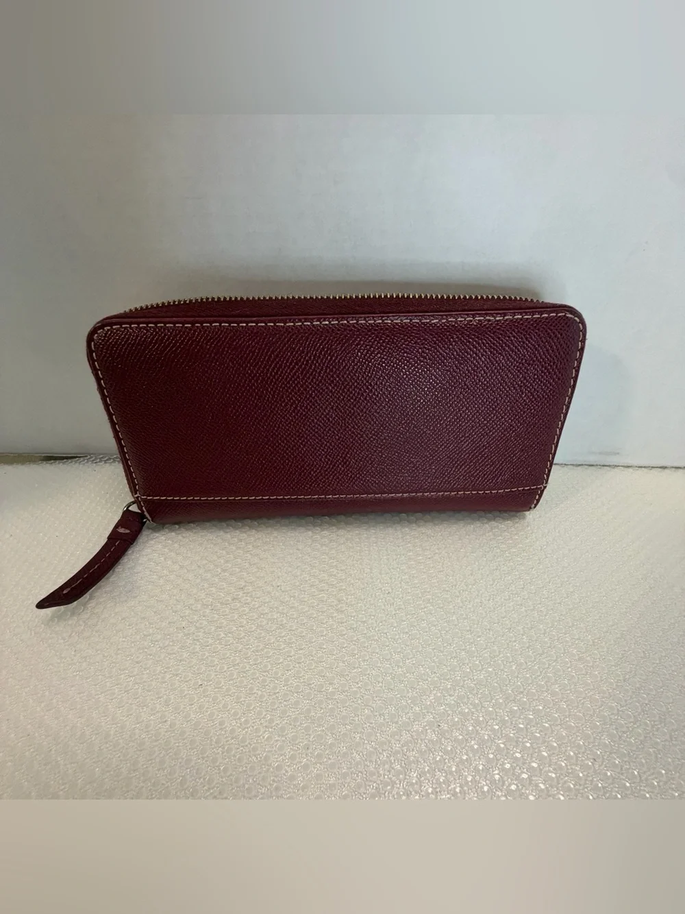 Dooney & Bourke Wine Textured Zip Wallet with Gold Plaque